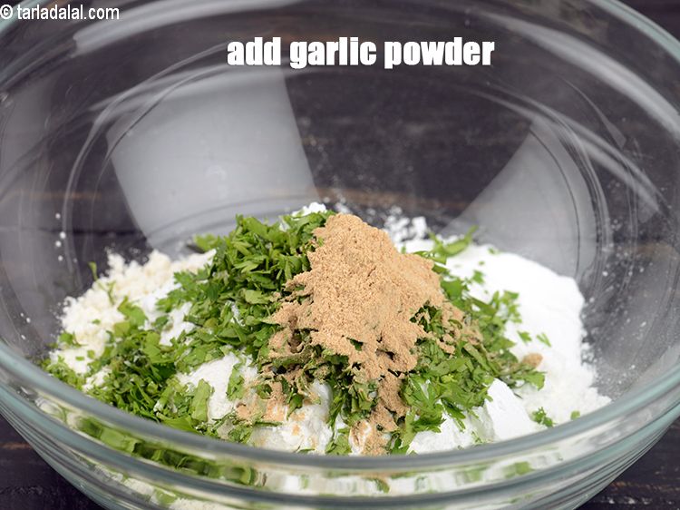 Step 7 – Add 1 tsp&nbsp;<a href="https://www.tarladalal.com/glossary-garlic-powder-lehsun-ka-powder-lahsun-ka-powder-351i">garlic (lehsun) powder</a>.
