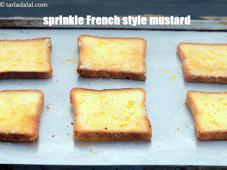 Step 6 – Sprinkle little <a href="https://www.tarladalal.com/glossary-mustard-paste-sarson-ki-paste-rai-paste-1031i">a little french style mustard</a>.