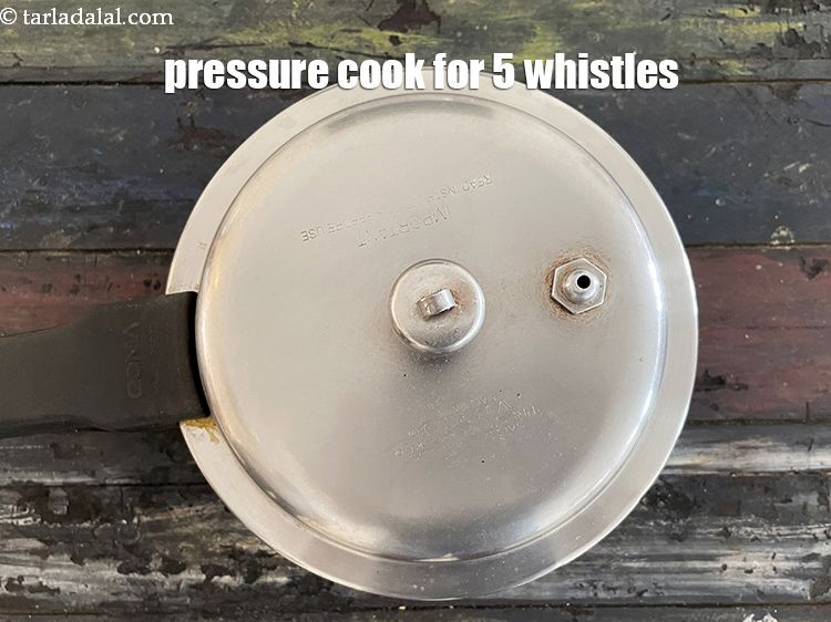 Step 7 – Pressure cook for 5&nbsp;whistles.