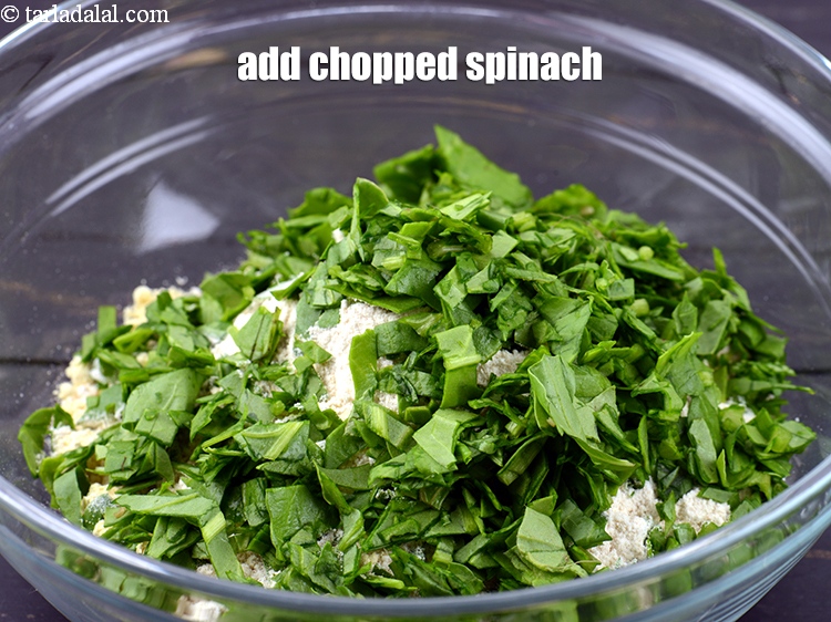 Step 6 – Add 1/2 cup <a href="https://www.tarladalal.com/glossary-chopped-spinach-780i">chopped spinach (palak)</a>.