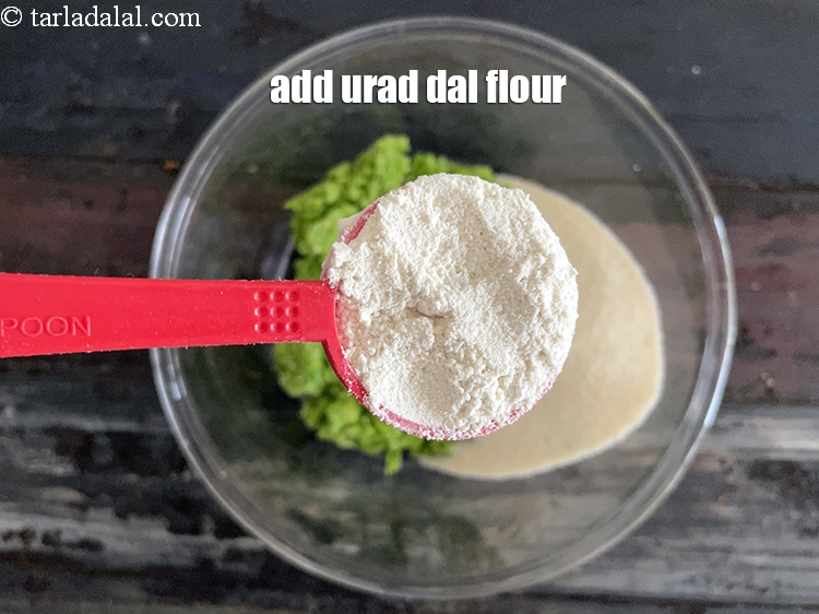 Step 8 – Add&nbsp;<meta charset="UTF-8" />5 tbsp&nbsp;<a href="glossary-urad-dal-flour-split-black-lentil-flour-urad-dal-ka-atta-1036i">urad dal (split black lentil) flour</a>.