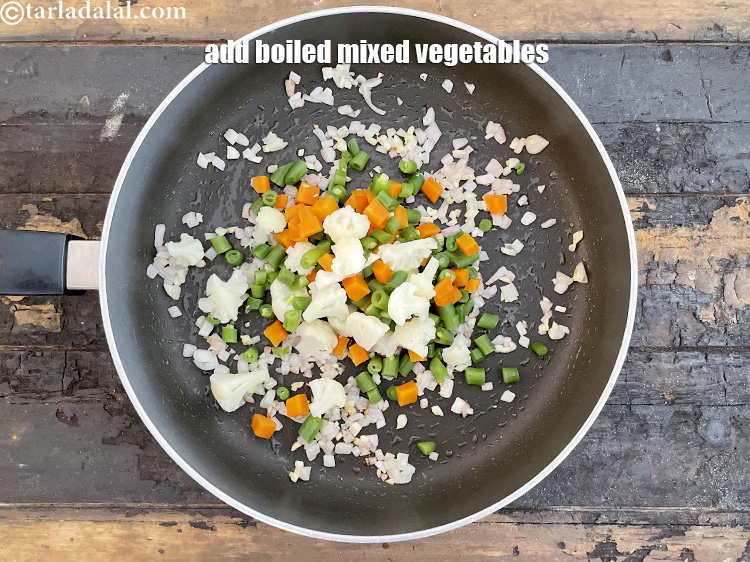 Step 13 – Add&nbsp;<meta charset="UTF-8" />1 cup&nbsp;<a href="glossary-chopped-and-boiled-mixed-vegetables-1884i">chopped and boiled mixed vegetables</a>(french beans , carrot and cauliflower).