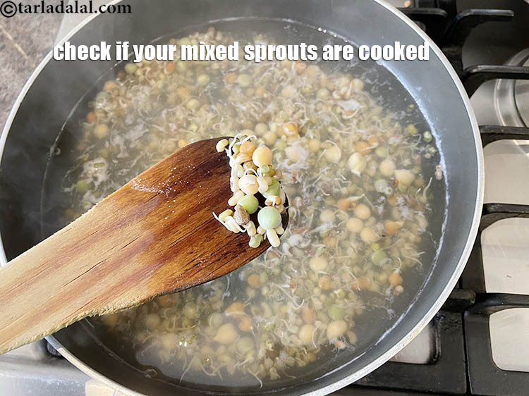 Step 10 – <meta charset="UTF-8" /><strong>Check if your mixed sprouts are cooked.&nbsp;</strong>Do this by taking a laddle and …