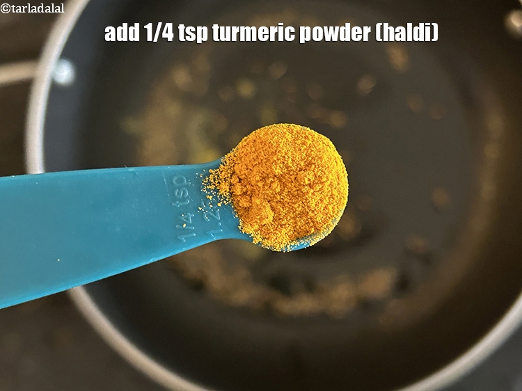 Step 9 – Add&nbsp;<meta charset="UTF-8" />1/4 tsp&nbsp;<a href="glossary-turmeric-powder-haldi-645i">turmeric powder (haldi)</a>.
