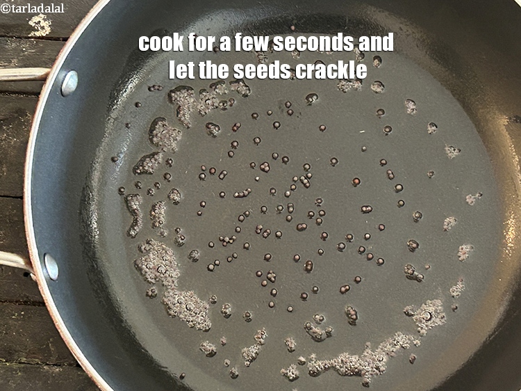 Step 8 – Cook for a few seconds and let the seeds crackle.