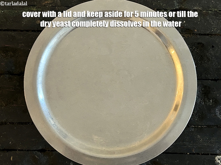 Step 7 – Cover with a lid and keep aside for 5 minutes or till the dry yeast …