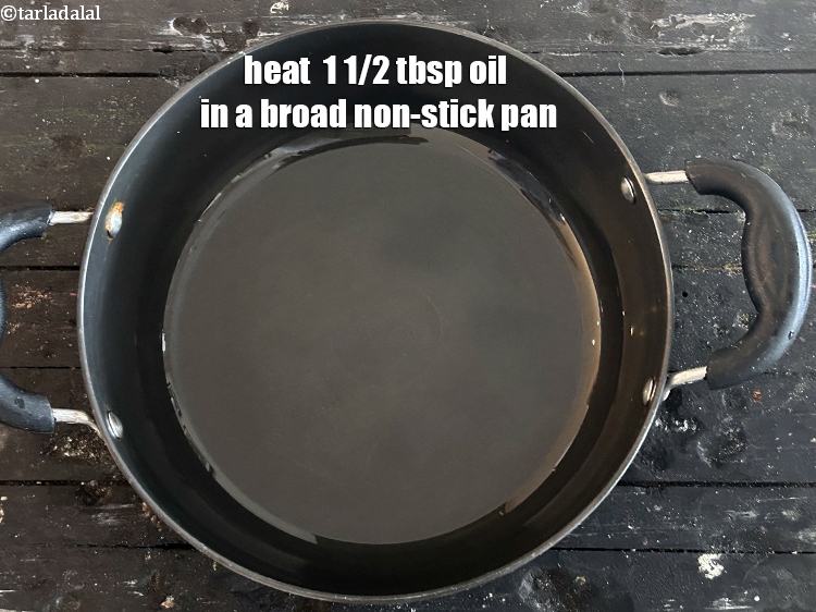 Step 7 – <meta charset="UTF-8" />Heat 1 1/2 tbsp&nbsp;<a href="glossary-oil-671i">oil</a>&nbsp;in a broad non-stick pan.
