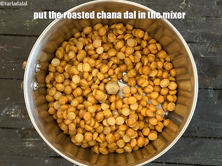 Step 13 – Put the roasted chana dal in the mixer.