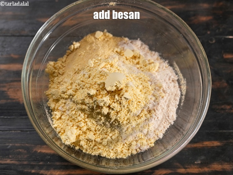 Step 7 – Add &frac14; cup <a href="https://www.tarladalal.com/glossary-besan-chana-dal-flour-bengal-gram-flour-952i">besan (bengal gram flour)</a>.&nbsp;