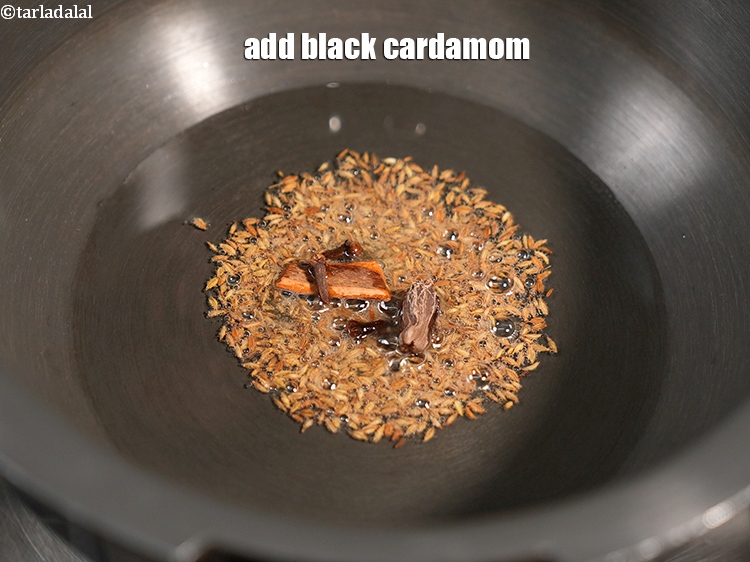 Step 7 – Add 1 <a href="https://www.tarladalal.com/glossary-black-cardamom-badi-elaichi-moti-elaichi-263i">black cardamom (badi elaichi)</a>.&nbsp;