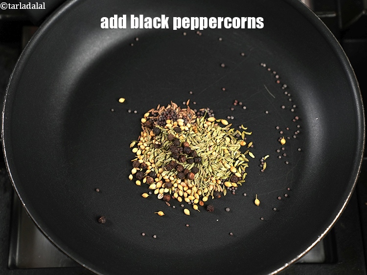 Step 7 – Add &frac14; tsp <a href="https://www.tarladalal.com/glossary-black-peppercorns-kali-mirch-kalimirch-566i">black peppercorns (kalimirch)</a>.