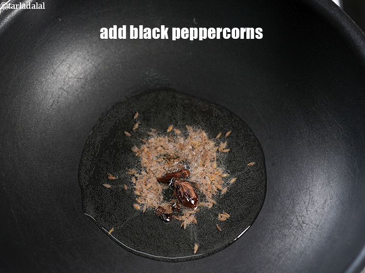 Step 7 – Add 3 black peppercorns.&nbsp;