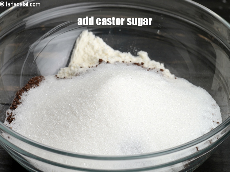 Step 7 – Add 3/4 cup <a href="https://www.tarladalal.com/glossary-castor-sugar-279i">castor sugar</a>.