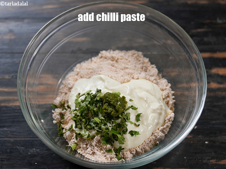Step 14 – Add 1 tsp <a href="https://www.tarladalal.com/chilli-paste-22538r">chilli paste</a>.
