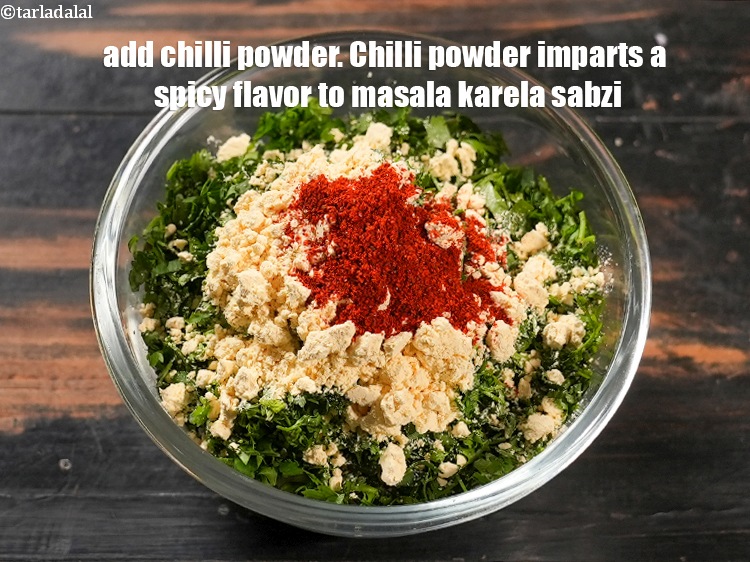 Step 7 – Add 1 tsp <a href="https://www.tarladalal.com/glossary-chilli-powder-red-chilli-powder-339i">chilli powder</a>. Chilli powder imparts a spicy flavor to masala karela …