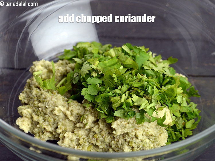 Step 7 – Add 3 tbsp of <a href="https://www.tarladalal.com/glossary-chopped-coriander-783i">chopped coriander (dhania)</a>.