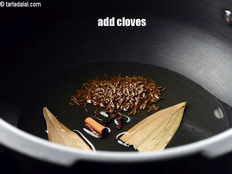 Step 7 – Add 3 cloves.