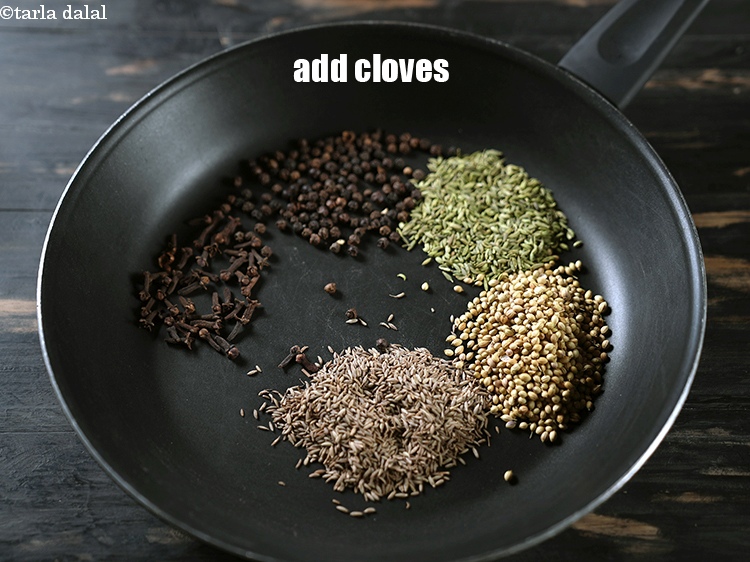 Step 7 – Add 1 tsp&nbsp;<a href="https://www.tarladalal.com/glossary-cloves-laung-lavang-322i">cloves (laung / lavang)</a>.