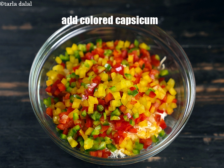 Step 7 – Add 1/2 cup finely chopped colored capsicum.
