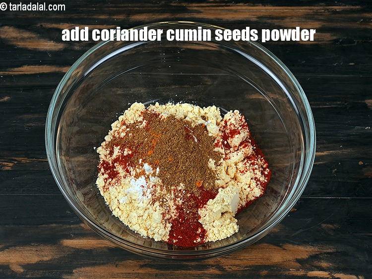 Step 8 – Add 1 tsp <a href="https://www.tarladalal.com/glossary-coriander-dhania-kothmir-369i">coriander (dhania)</a>&nbsp;<a href="https://www.tarladalal.com/glossary-cumin-seeds-powder-jeera-powder-zeera-powder-382i">cumin seeds (jeera) powder</a>.