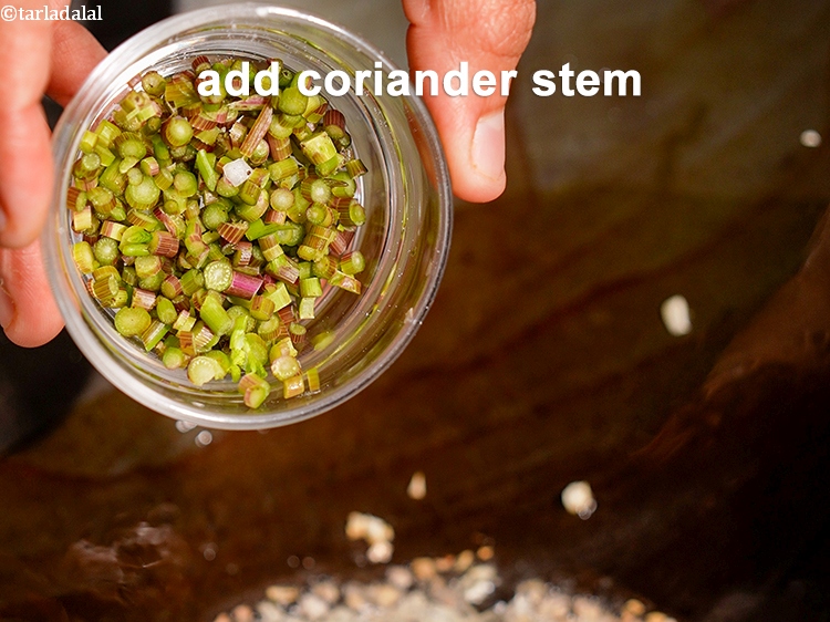 Step 10 – Add 1 tbsp finely chopped coriander stem.