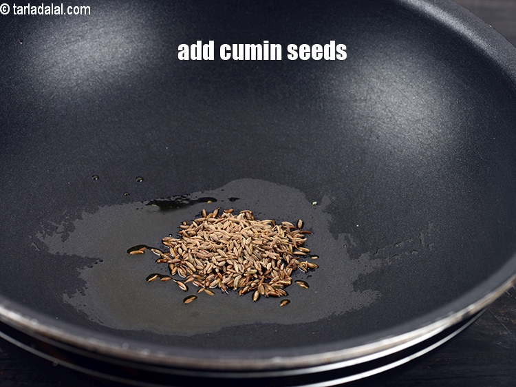Step 7 – Add 1 tsp <a href="https://www.tarladalal.com/glossary-cumin-seeds-jeera-zeera-381i">cumin seeds (jeera)</a>.