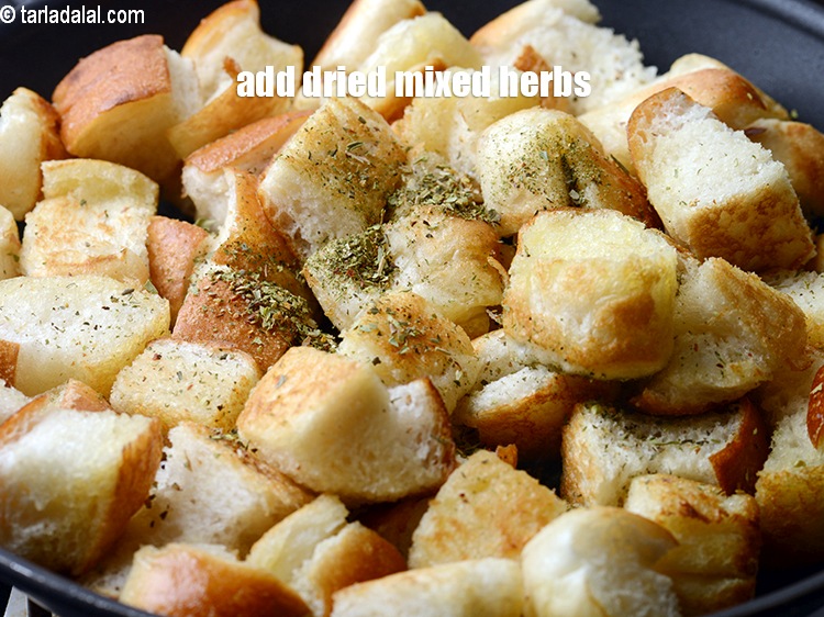 Step 8 – Add 1/2 tsp <a href="https://www.tarladalal.com/glossary-dried-mixed-herbs-466i">dried mixed herbs</a>.&nbsp;