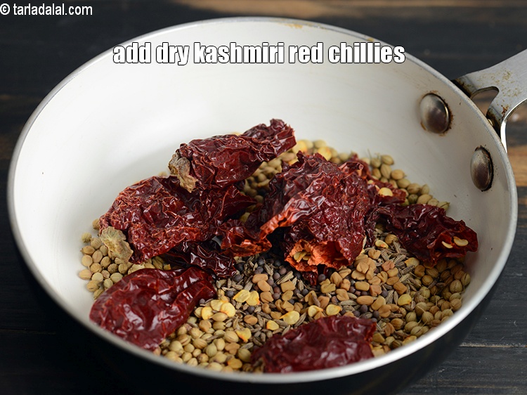 Step 8 – Add 5&nbsp;<a href="https://www.tarladalal.com/glossary-whole-dry-kashmiri-red-chillies-kashmiri-mirch-kashmiri-lal-mirch-332i">whole dry kashmiri red chillies</a>.&nbsp;