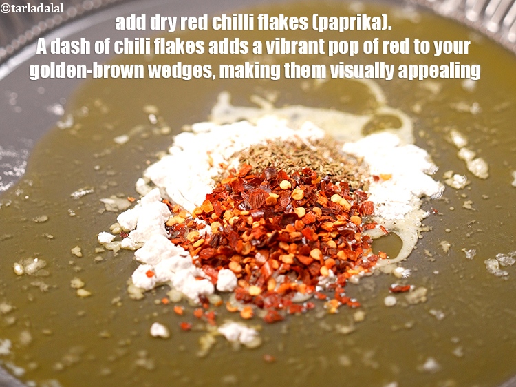 स्टेप 7 – १ टी-स्पून&nbsp;<a href=""https://www.tarladalal.com/glossary-dry-red-chilli-flakes-paprika-hindi-338i"">सूखी लाल मिर्च के फ्लैकस्</a>&nbsp;डालें&nbsp;। मिर्च के गुच्छे …