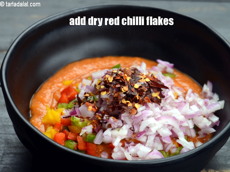 Step 7 – Add 1 tsp&nbsp;<a href="https://www.tarladalal.com/glossary-dry-red-chilli-flakes-paprika-338i">dry red chilli flakes (paprika)</a>.