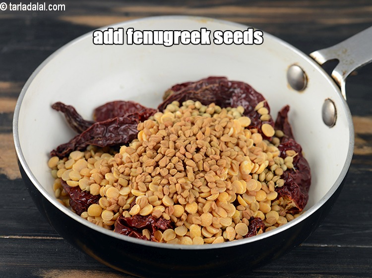 Step 8 – Add 1 1/2 tsp <a href="https://www.tarladalal.com/glossary-fenugreek-seeds-methi-dana-methi-ke-dane-methi-seeds-991i">fenugreek (methi) seeds</a>.