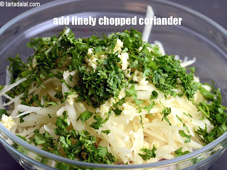 Step 7 – Add &frac14; cup finely&nbsp;<a href="https://www.tarladalal.com/glossary-chopped-coriander-783i">chopped coriander (dhania)</a>.