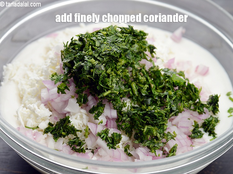 Step 7 – Add 2 tbsp finely <a href="https://www.tarladalal.com/glossary-chopped-coriander-783i">chopped coriander (dhania)</a>.