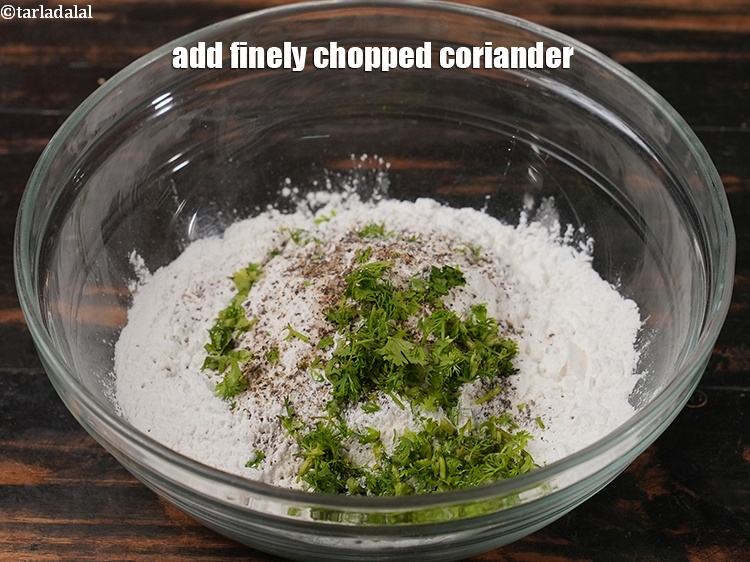 Step 7 – Add 1 tbsp finely <a href="https://www.tarladalal.com/glossary-chopped-coriander-783i">chopped coriander (dhania)</a>.