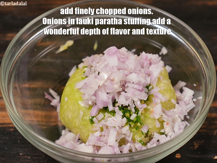 Step 7 – Add &frac14; cup finely <a href="https://www.tarladalal.com/glossary-chopped-onions-722i">chopped onions</a>. Onions in lauki paratha stuffing add a wonderful …