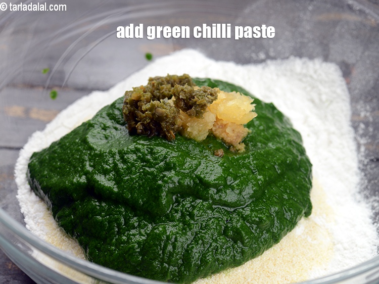 Step 7 – Add 1 tsp <a href="https://www.tarladalal.com/glossary-green-chilli-paste-hari-mirch-ki-paste-mirchi-paste-333i">green chilli paste</a>.