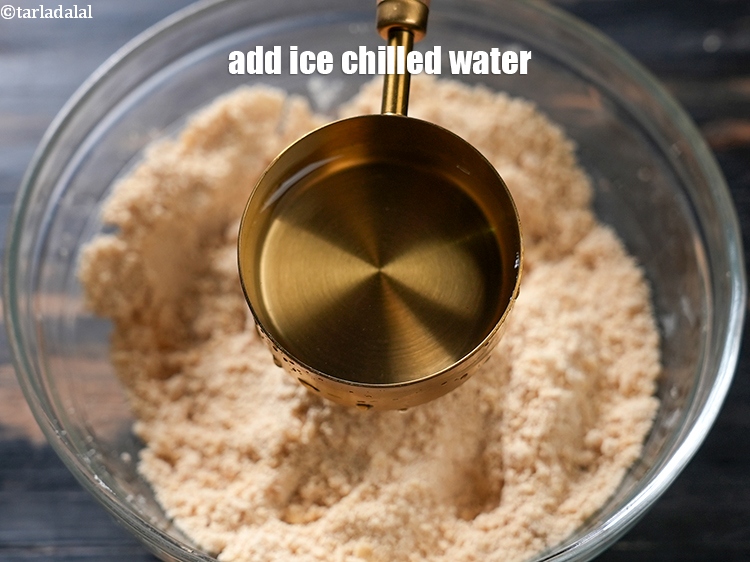Step 7 – Gradually add &frac12; cup ice chilled water.