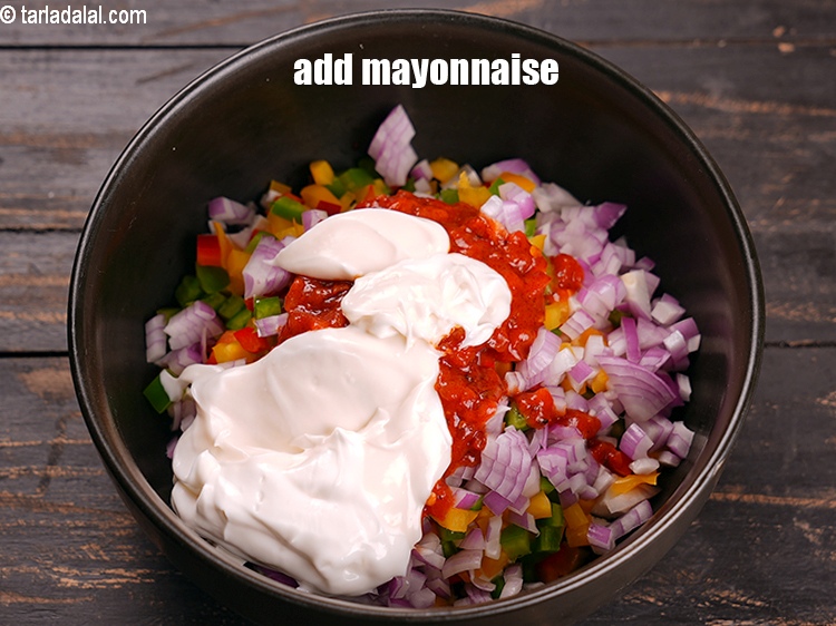 Step 8 – Add 5 tbsp <a href="https://www.tarladalal.com/glossary-mayonnaise-505i">mayonnaise</a>.