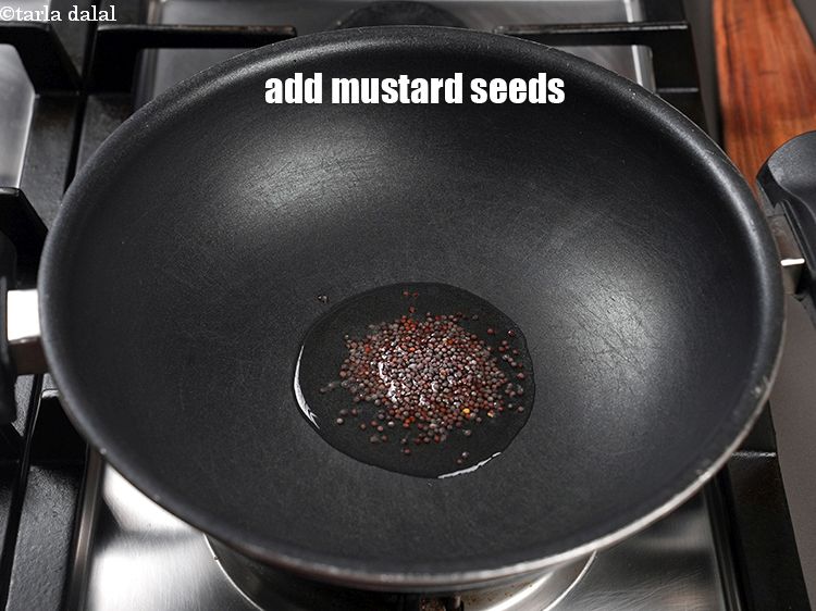 Step 7 – Add 1 tsp mustard seeds.