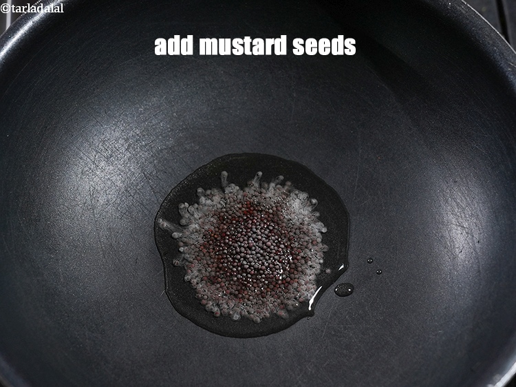 Step 7 – Add 1 tsp mustard seeds.