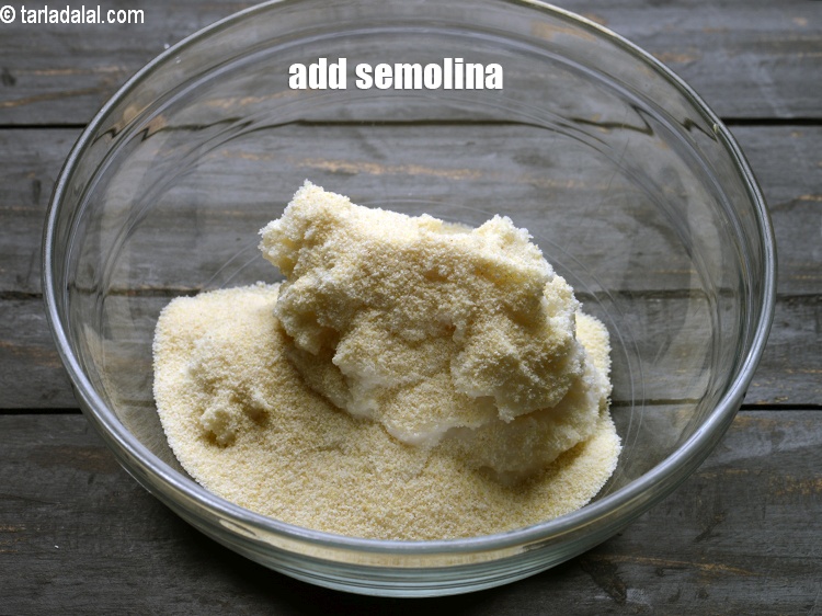 Step 7 – Add &frac14; cup&nbsp;<a href="https://www.tarladalal.com/glossary-semolina-sooji-rava-rawa-603i">semolina (rava / sooji)</a>.