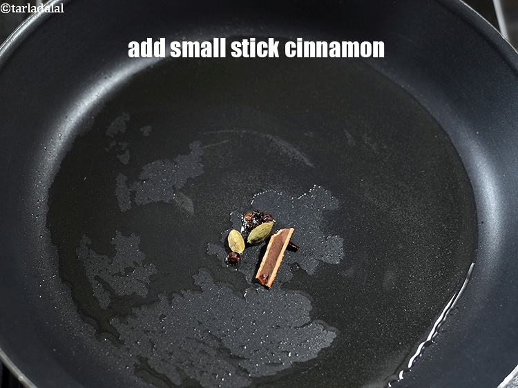 Step 11 – Add 1 small stick <a href="https://www.tarladalal.com/glossary-cinnamon-dalchini-346i">cinnamon (dalchini)</a>.