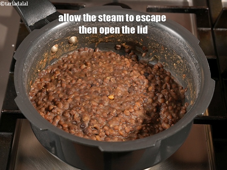 Step 7 – Allow the steam to escape then open the lid.
