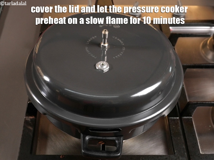 Step 7 – Cover the lid and let the pressure cooker preheat on a slow flame for 10 …