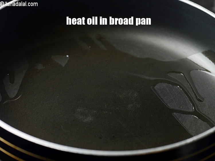 Step 7 – Heat 1 tbsp oil in a broad non-stick pan.