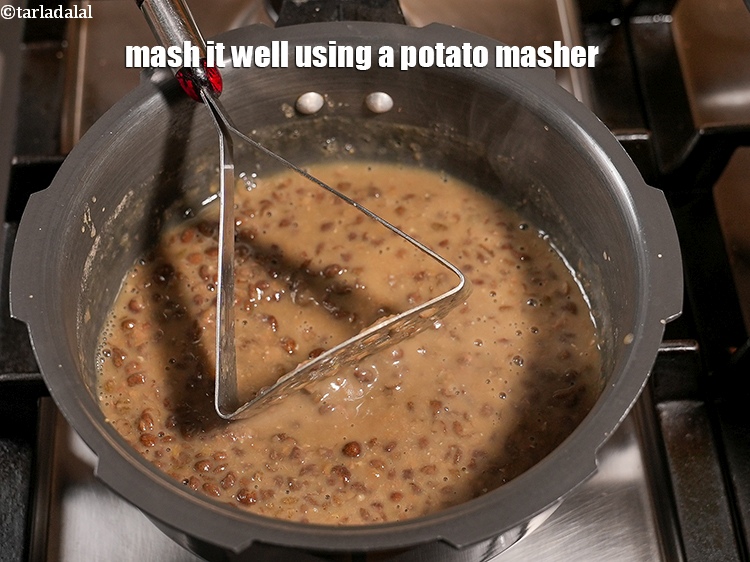 Step 7 – Mash it well using a potato masher and keep aside.
