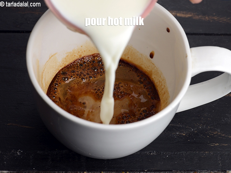 Step 7 – Pour &frac12; cup of hot milk over it.