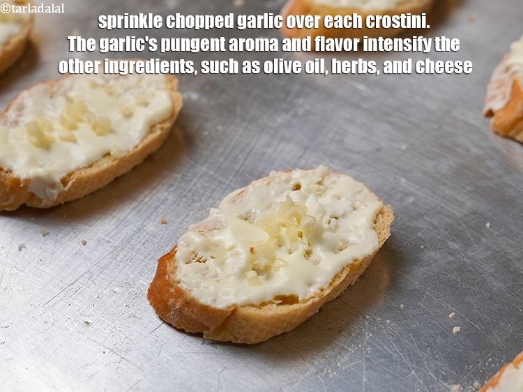 Step 7 – Sprinkle 1/8 tsp of <a href="https://www.tarladalal.com/glossary-chopped-garlic-790i">chopped garlic (lehsun)</a>&nbsp;over each crostini. The garlic&#39;s pungent aroma and …