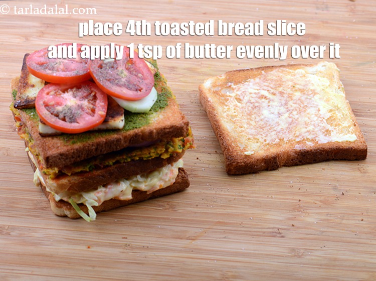 Step 53 – Place 4th toasted bread slice and apply 1 tsp of butter evenly over it.