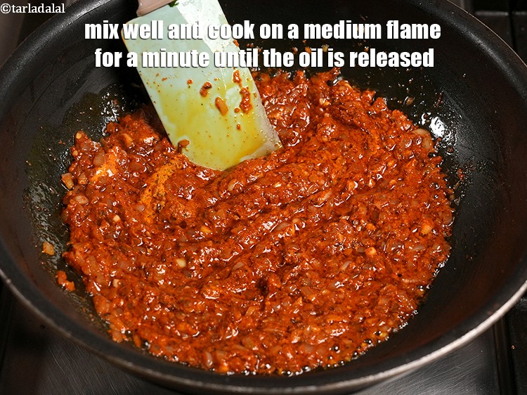 Step 55 – Mix well and cook on a medium flame for a minute until the oil is …
